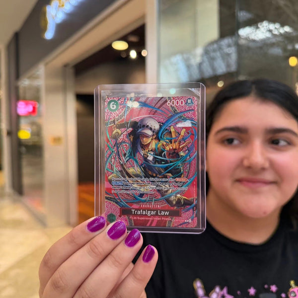 A collector showing off a big pull at Cards2Go Oxford Valley Mall in Langhorne, PA