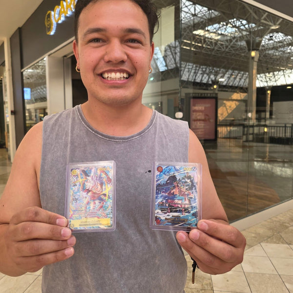 A collector showing off a big pull at Cards2Go Oxford Valley Mall in Langhorne, PA