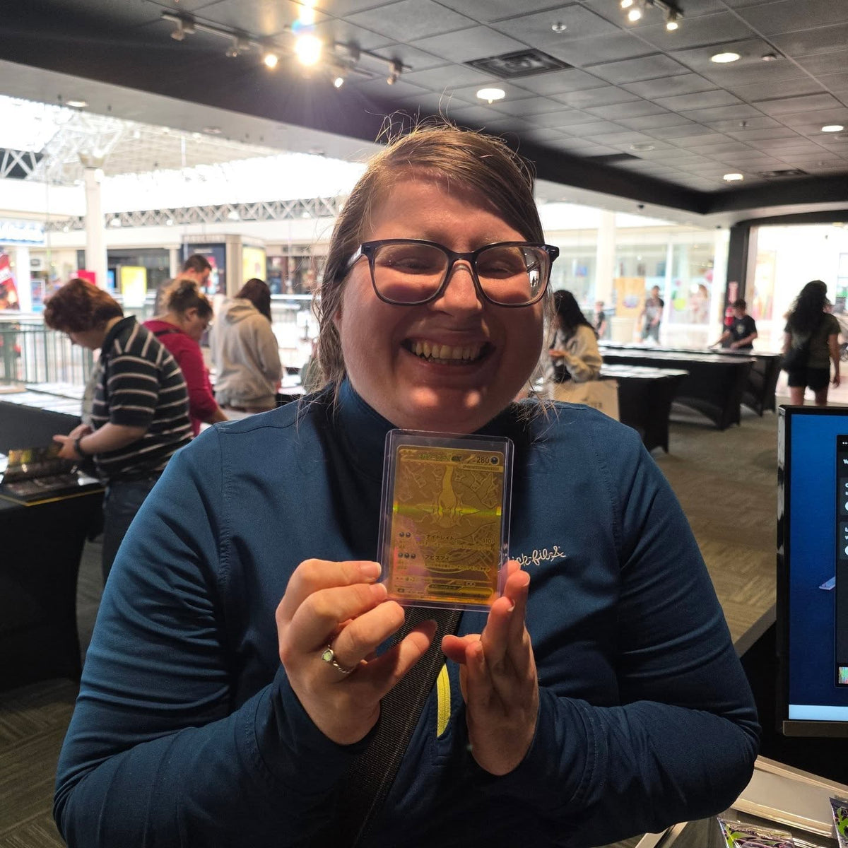A collector showing off a pull at Cards2Go